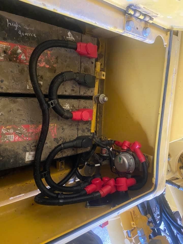 A Close-up of a Battery in a Box with Wires Coming Out of it — Auto Electrician Tamworth