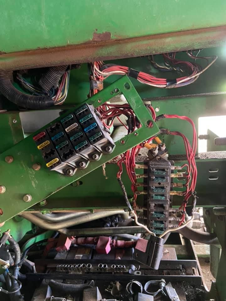 A Green Tractor with a Bunch of Wires Coming out of it — Auto Electrical Diagnostics Tamworth