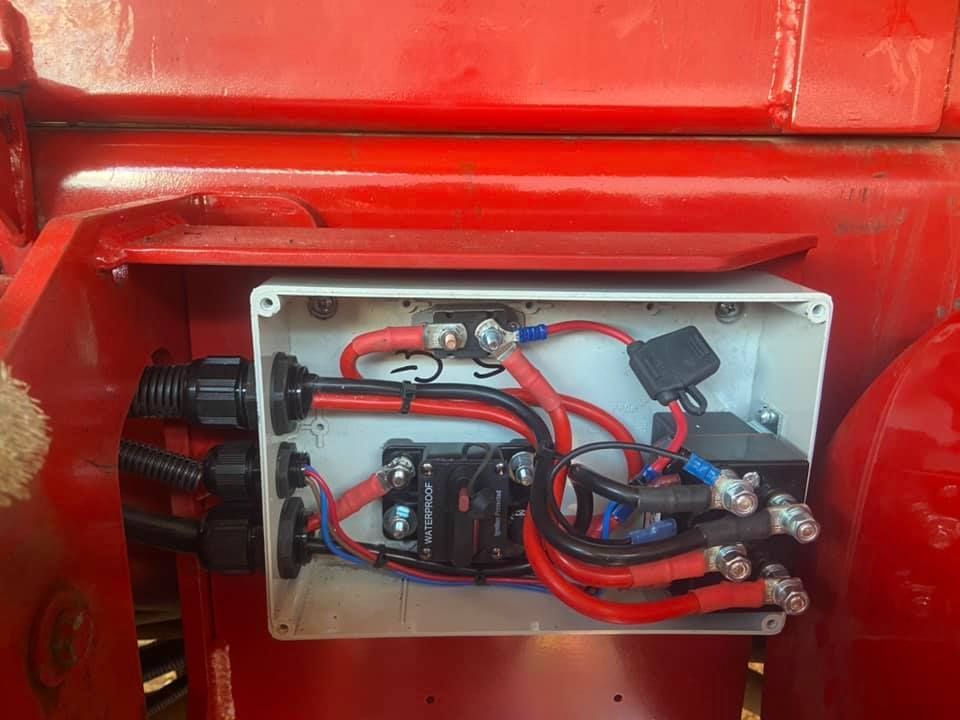 Auto Electrical Wires in a Box Mounted on Red Metal — Auto Electrical Service Tamworth