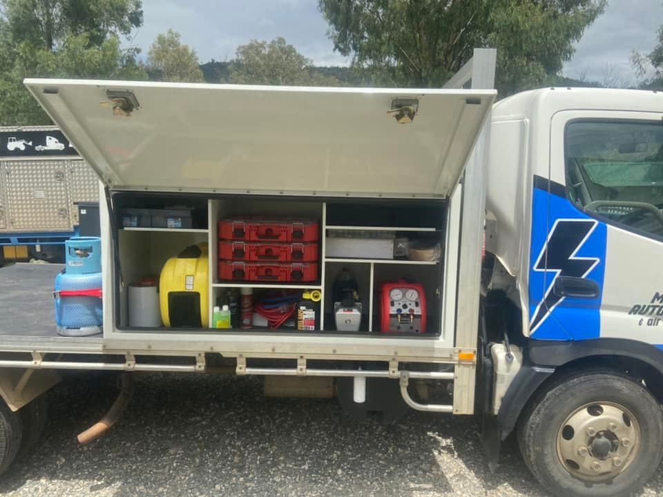 Mobile Service Truck with Side Door Open and Lot of Requirements in it — Auto Electrical Service Tamworth