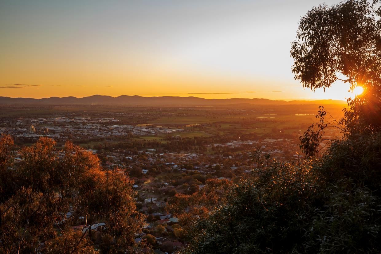 Sun Rising View Of Tamworth with Mountains and Houses — Auto Electrical Service in Tamworth