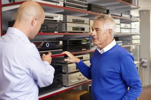Assisting a customer in the best sound options at Challenge hifi