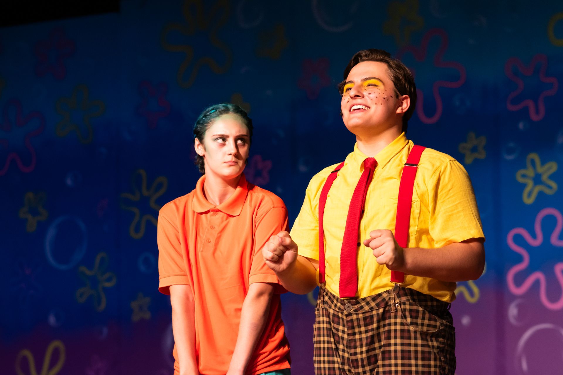 Two actors on stage in a 