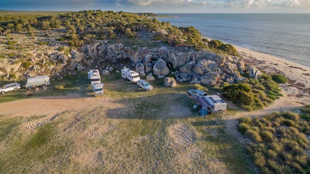 An Aerial View Of A Campground On A Rocky Cliff Near The Ocean — Geisler Truck & Trailer Wheel Alignments In Mackay, QLD