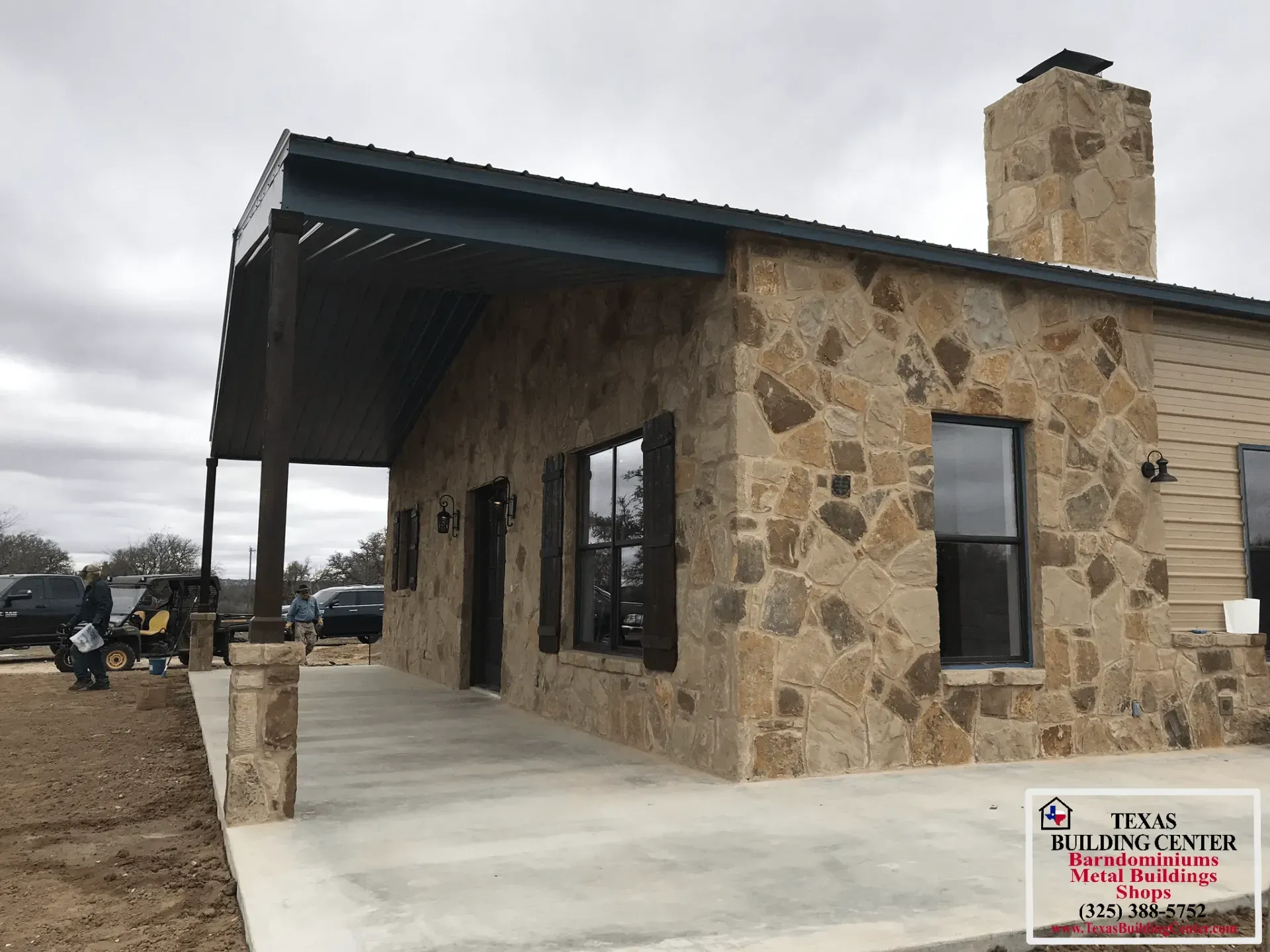 Stone-faced building with porch and chimney; Texas Building Center logo in the lower right.