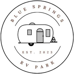 The logo for blue springs rv park shows a trailer in a circle.