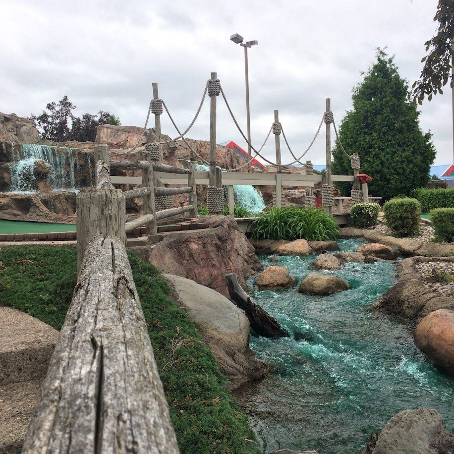 miniature golf course with stream