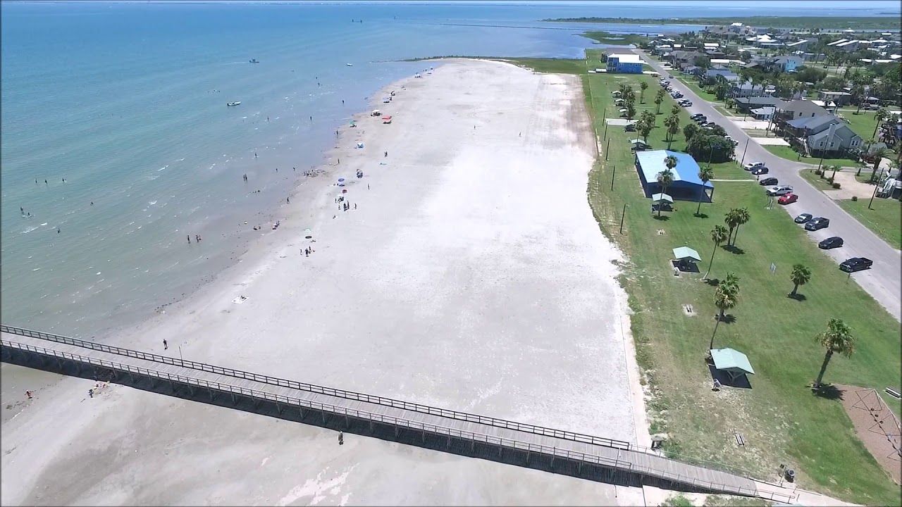 women walking on the beach