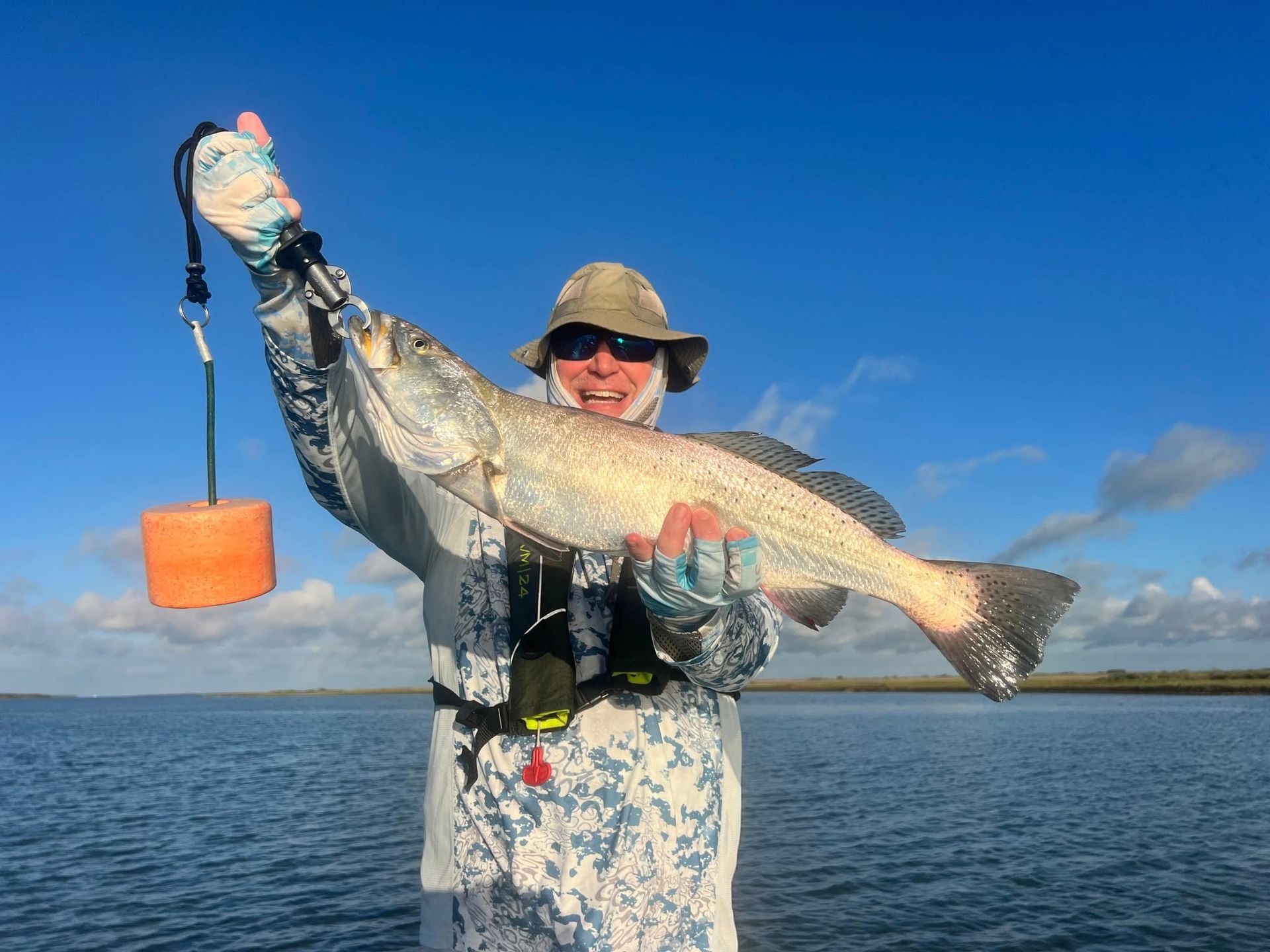 men fishing in small boat