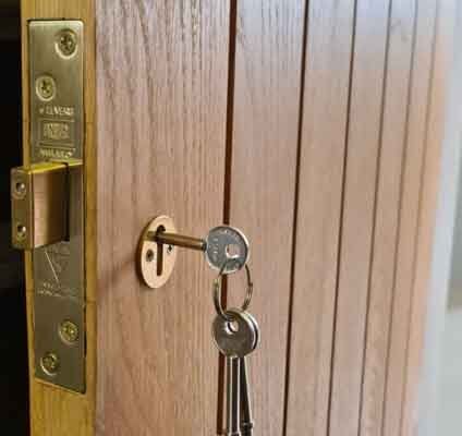 Union mortice lock in brass fitted to timber door