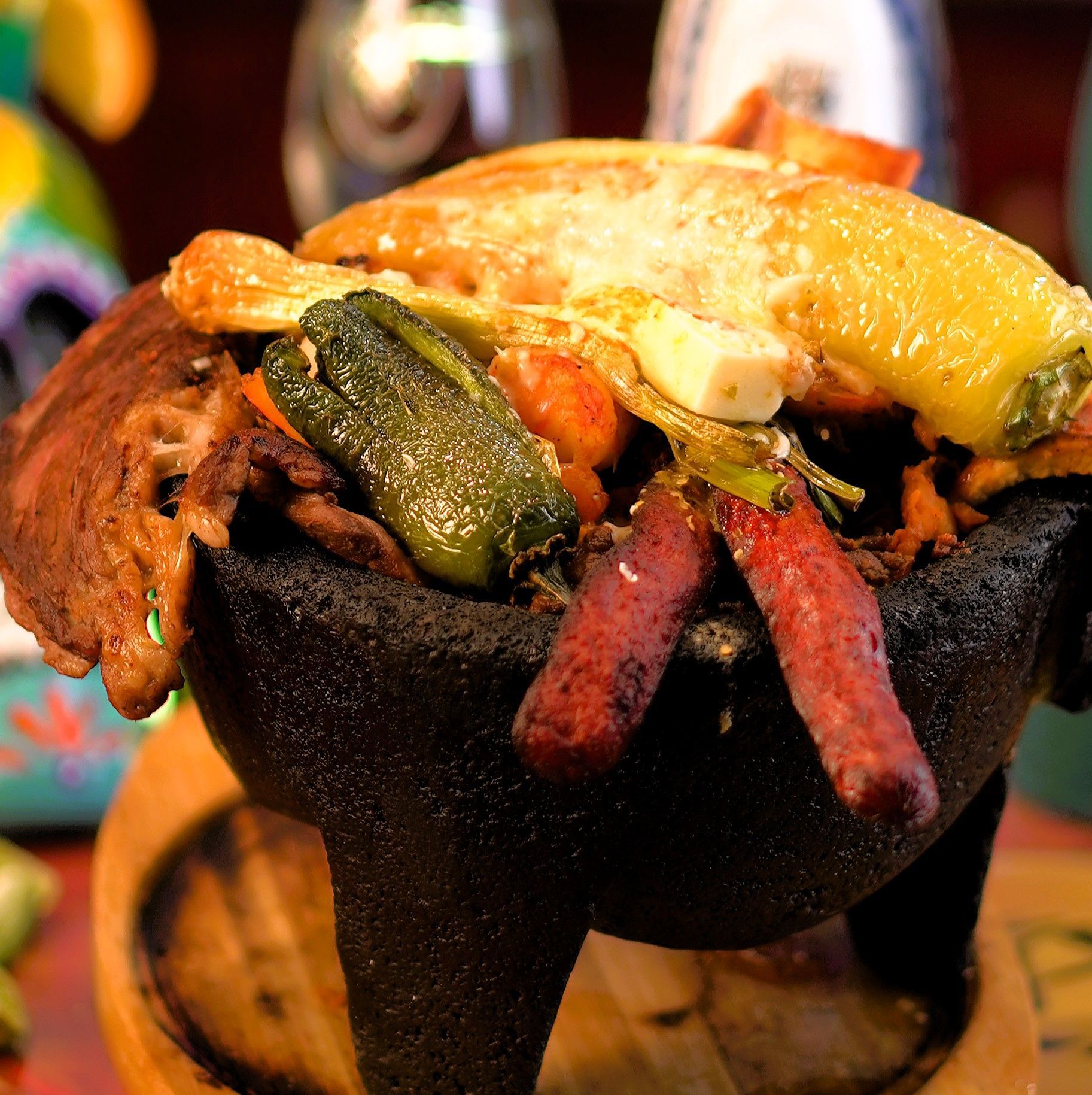 A close up of a bowl of food on a table