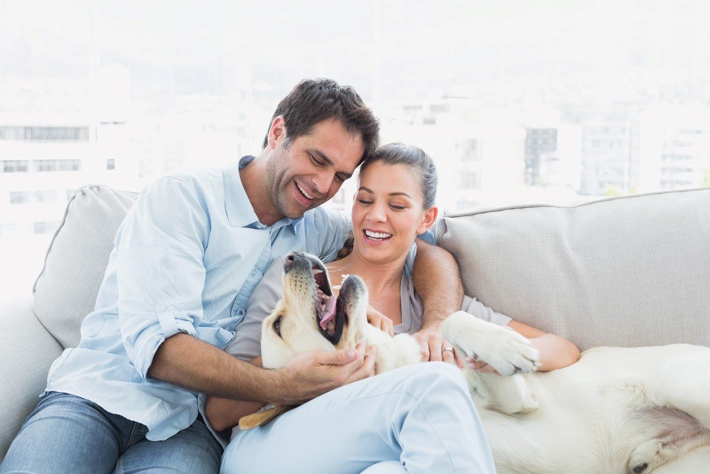 Happy Couple With Their Dog — Seattle, WA — South Seattle Veterinary Hospital