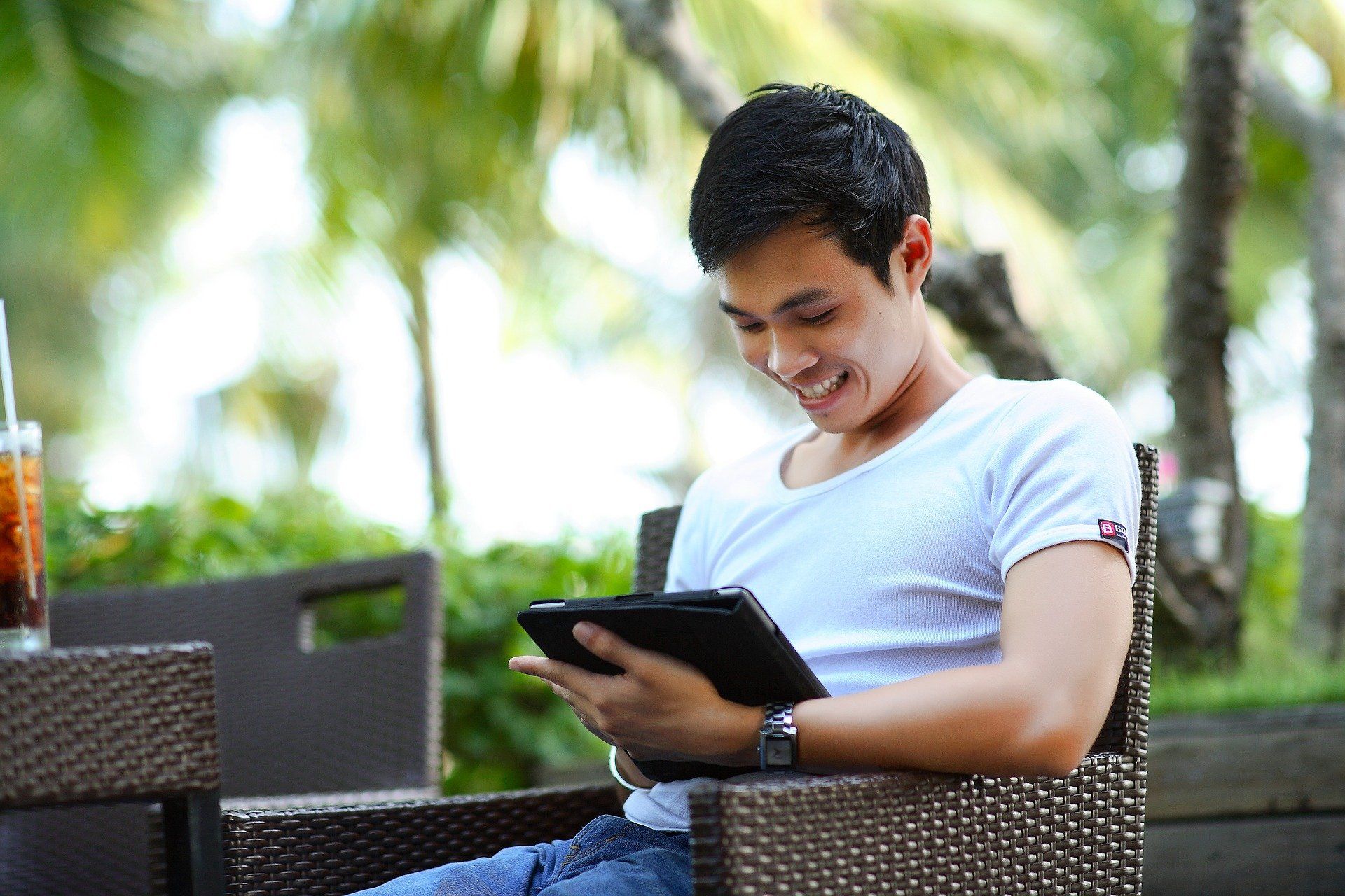 man looking at tablet 