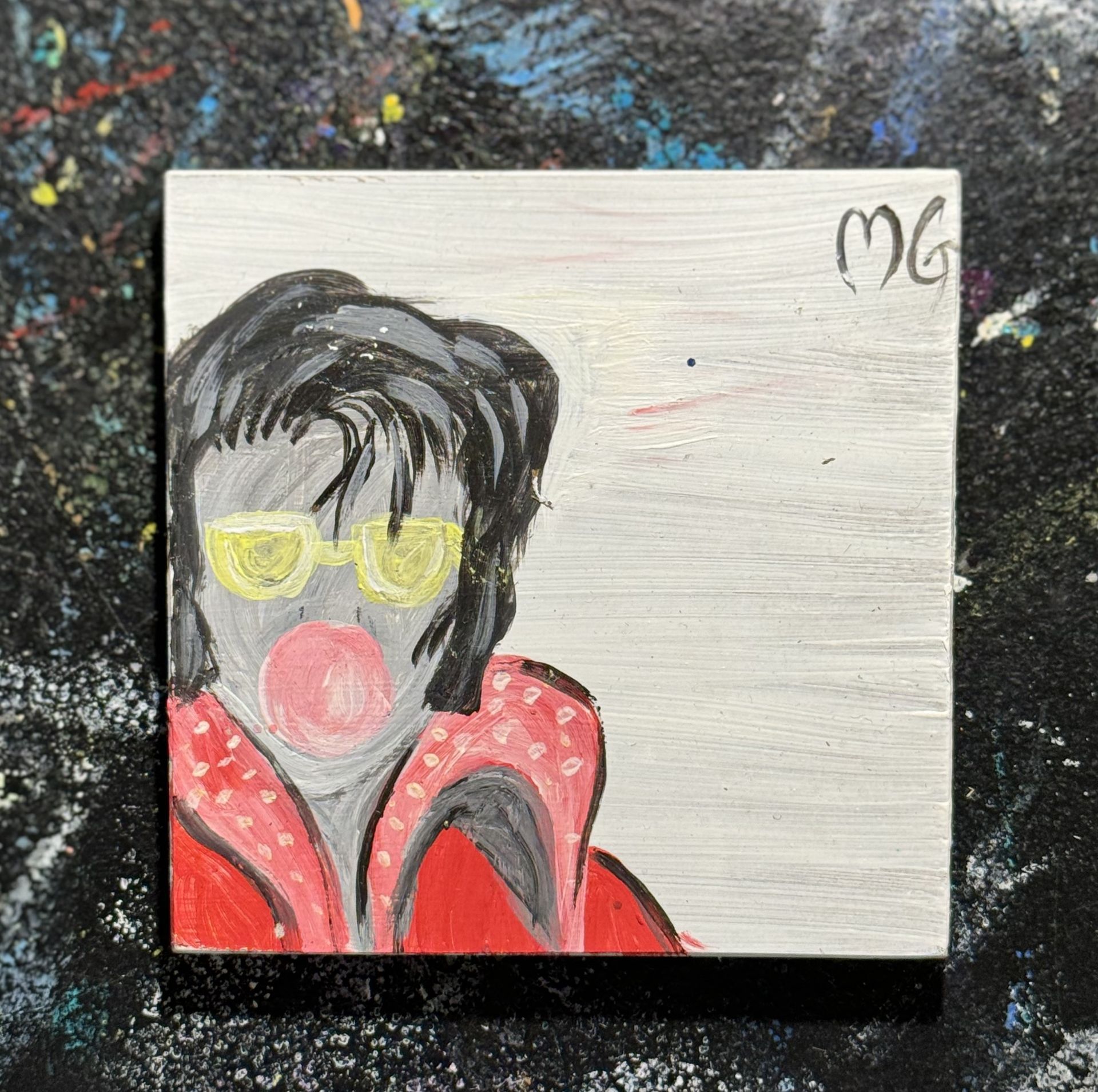 A painting of elvis presley blowing bubble gum