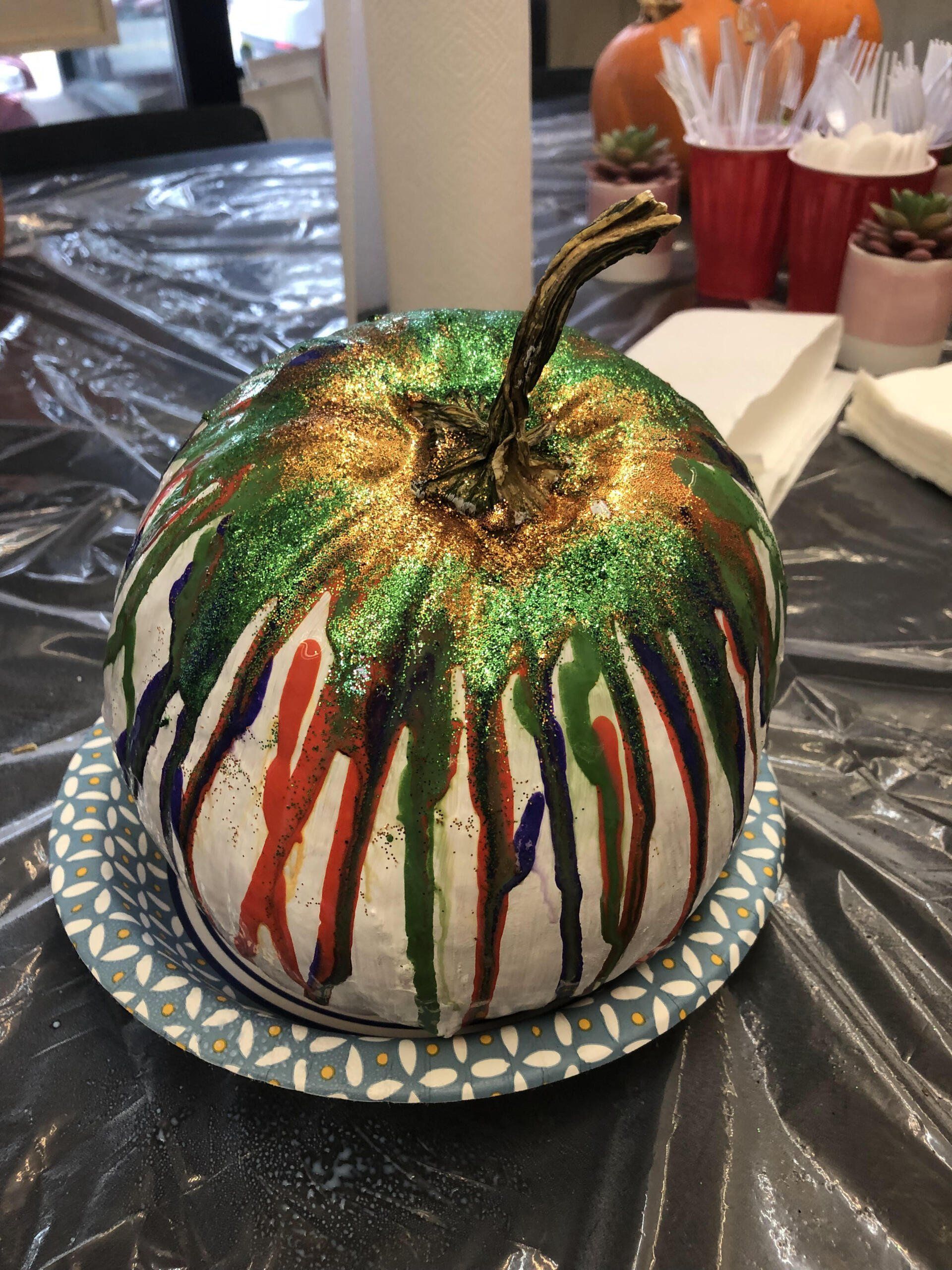 Poured paint over a pumpkin