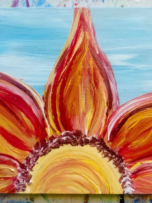 A painting of a sunflower with a blue sky in the background