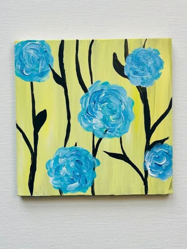 A painting of blue flowers on a yellow background