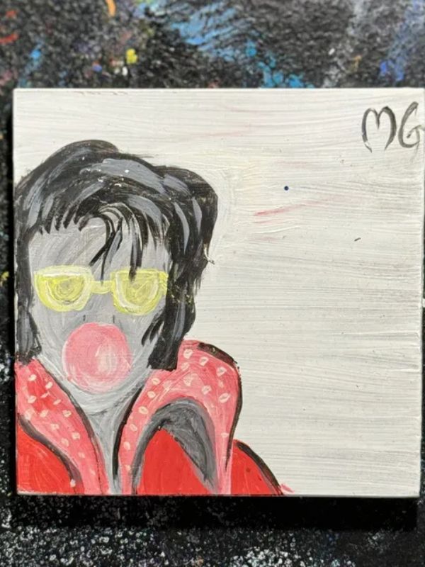 A painting of elvis presley blowing bubble gum