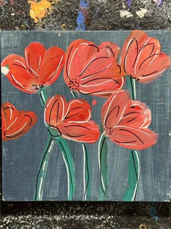 A painting of red flowers on a gray background