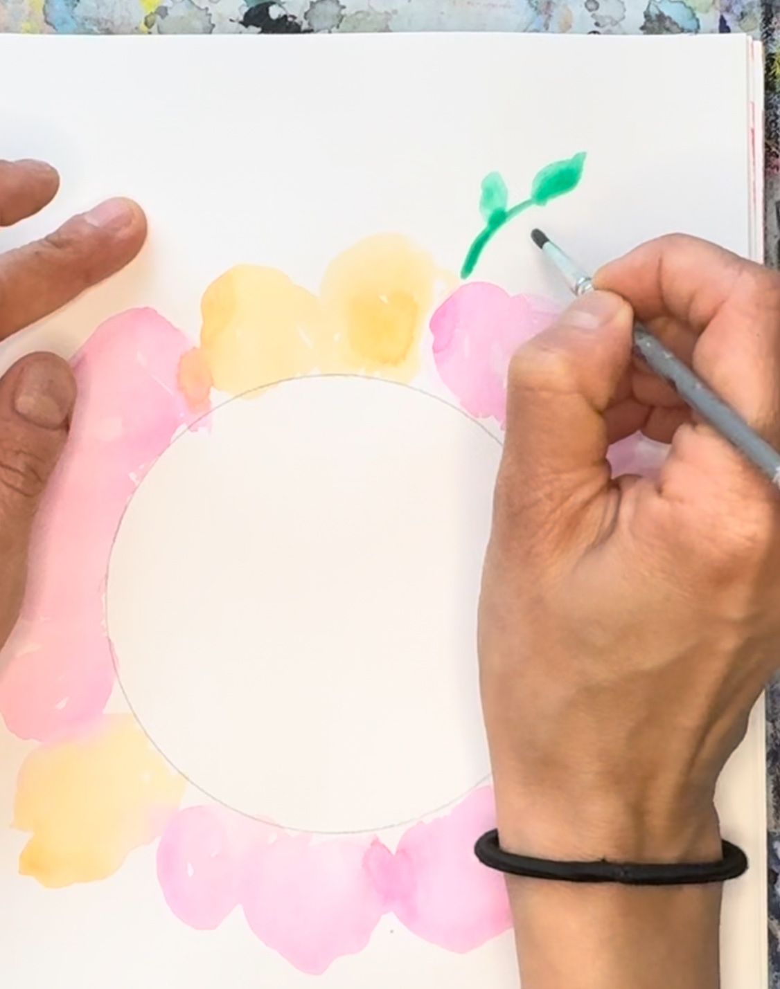 person painting leaves