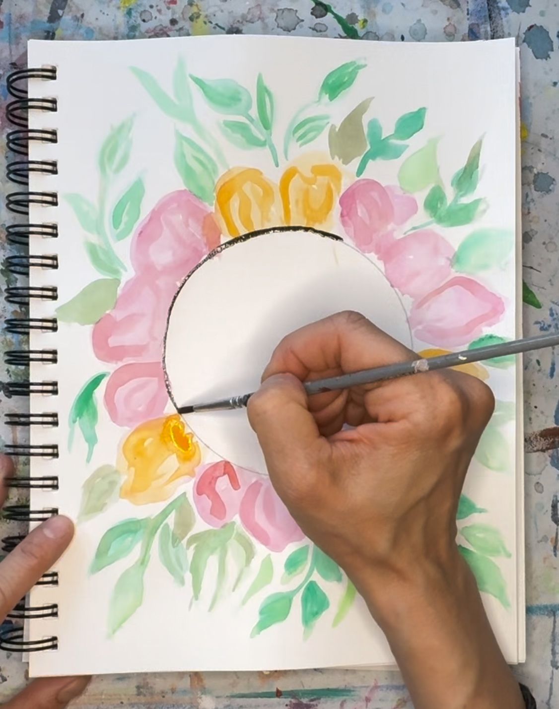 person painting watercolor petals