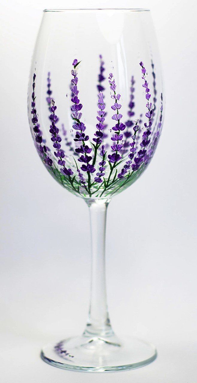 Purple flowers painted on wine glass