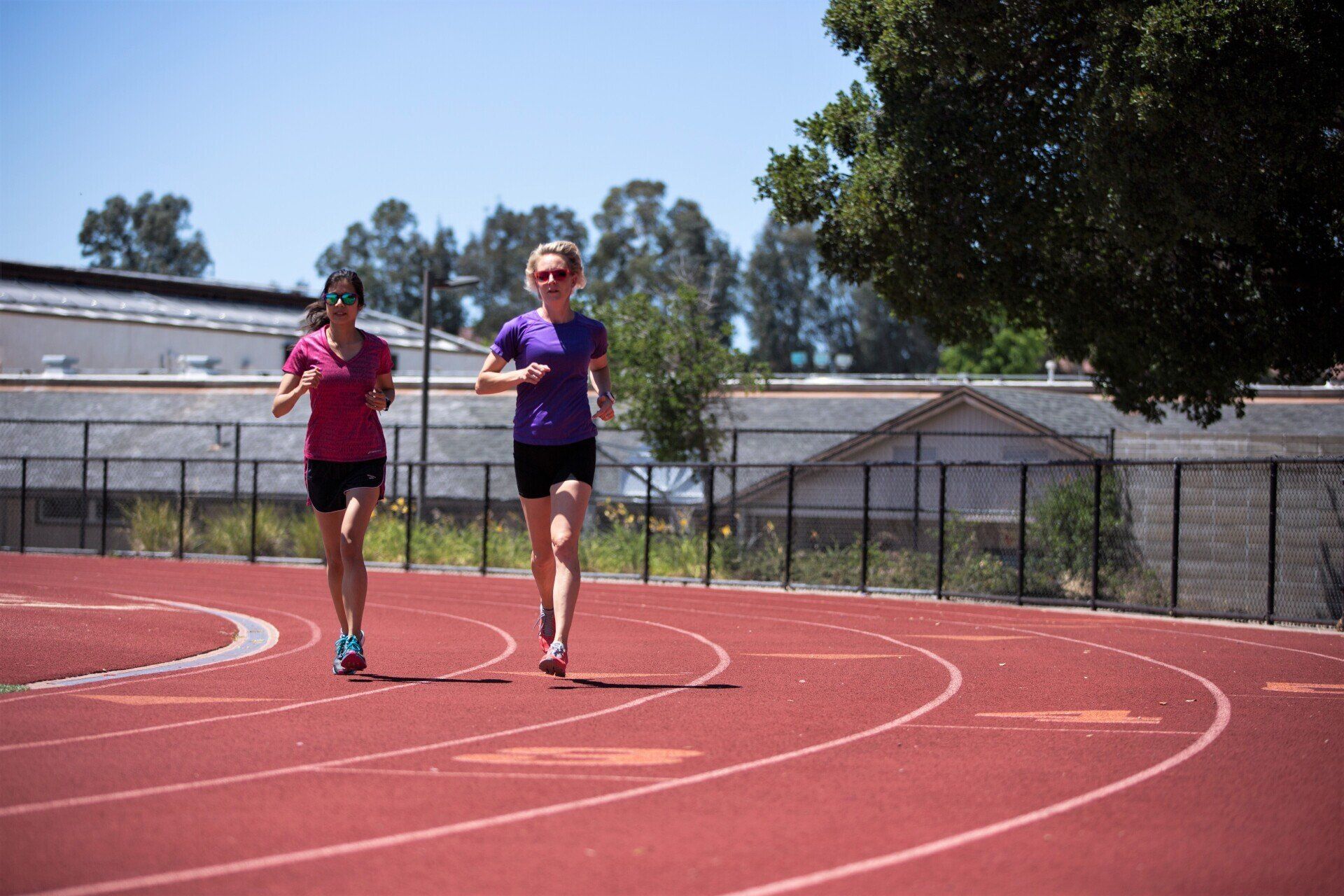 Coach Heini from Elements Running Education coaching at the track