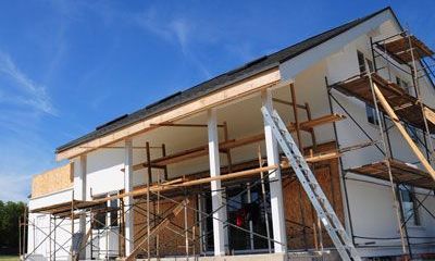 a man is working on the construction of a new house