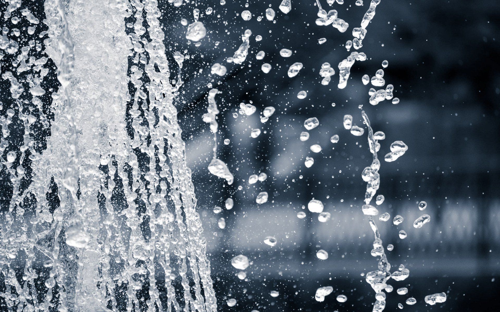 a close-up of a water pouring from above
