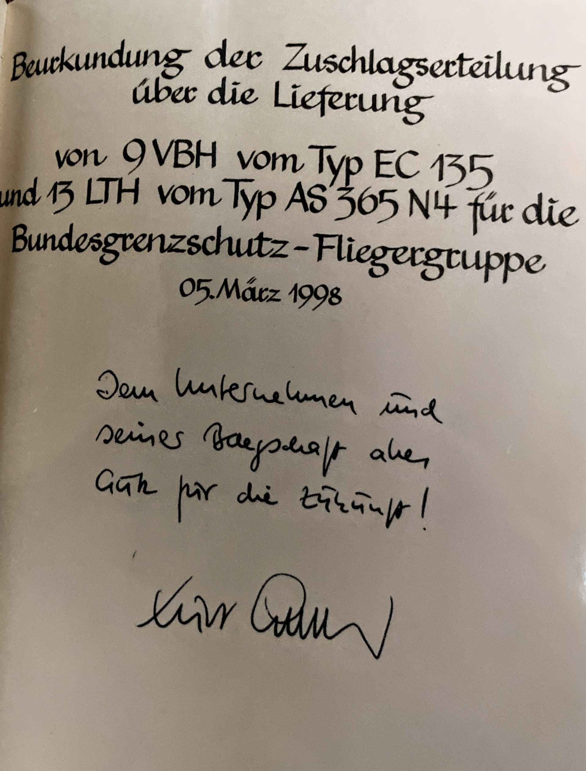 A book is opened to a page that says bundesgrenzschutz-fliegergruppe