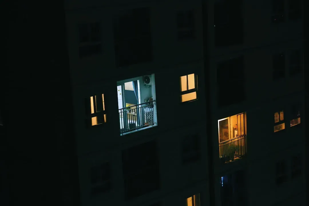 Gray phone handset icon on a white background