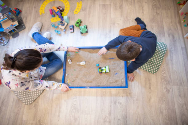 Peck Counseling's assortment of toys for play therapy and more displayed on and in an open dresser.