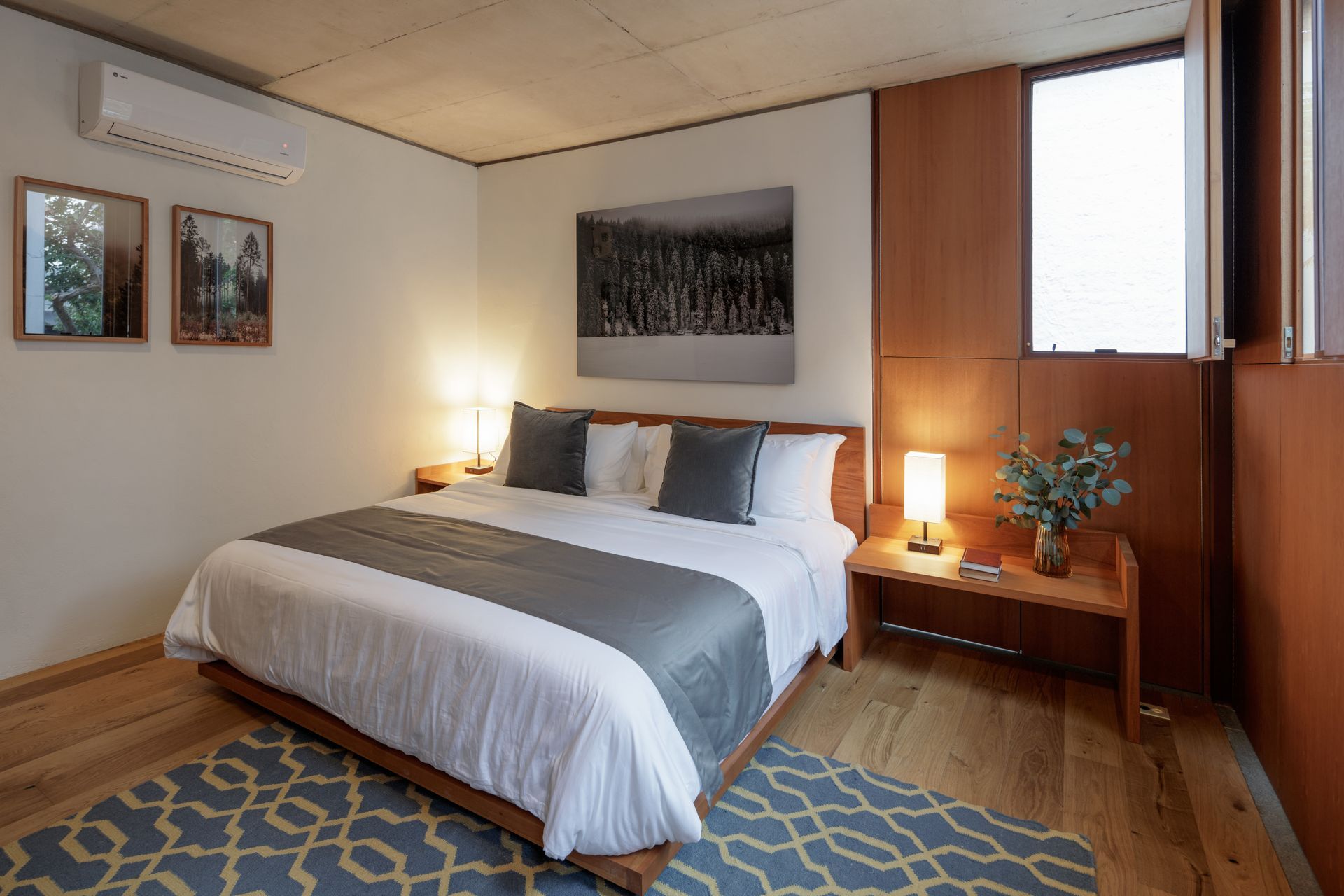 There is a large bed in the middle of the room.