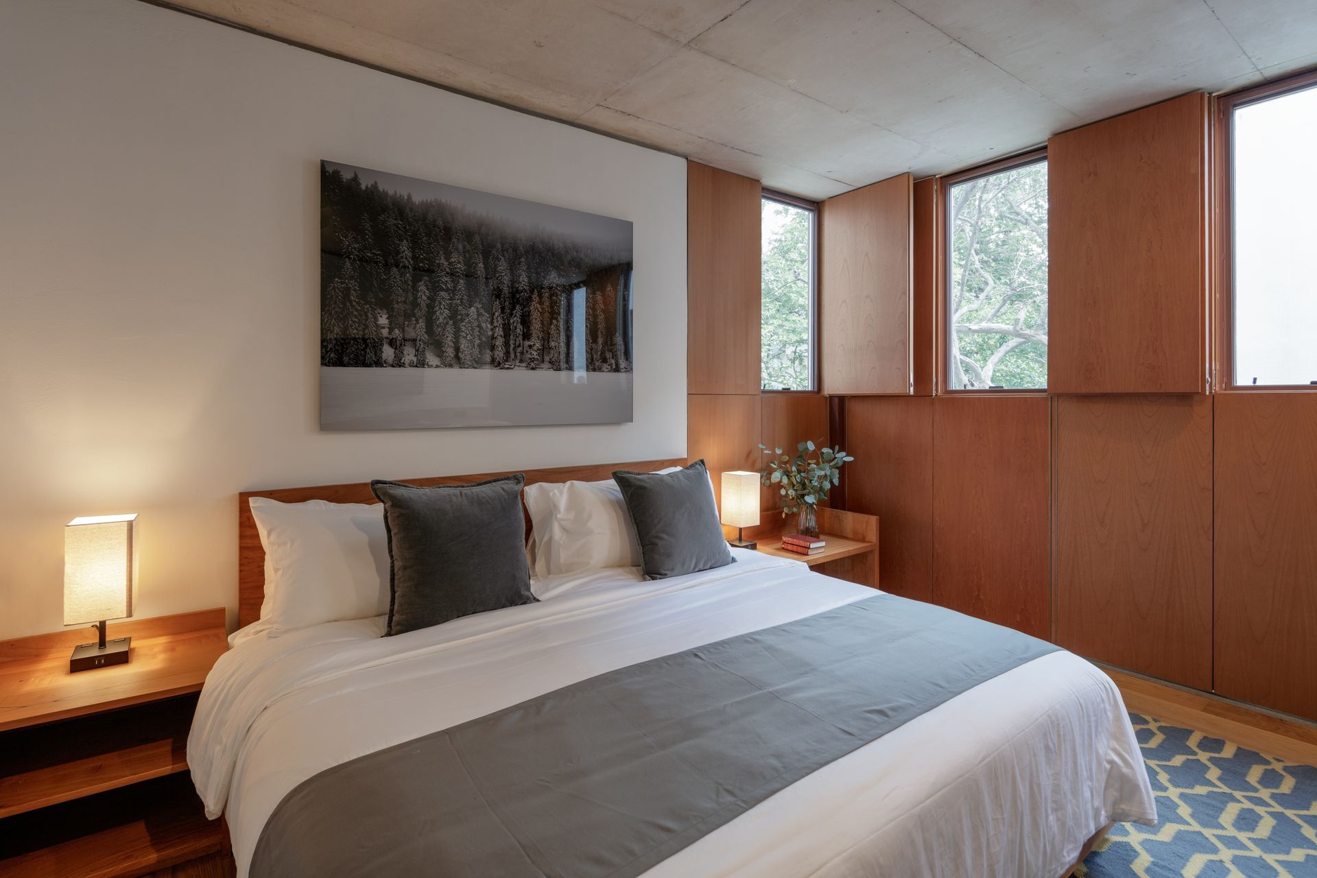 There is a large bed in the middle of the room.