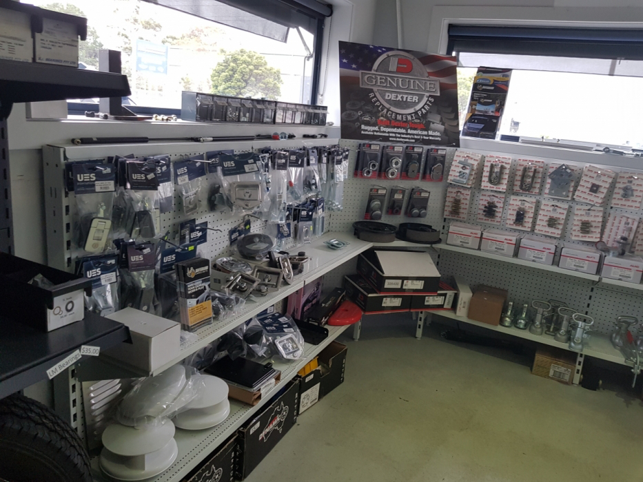 A store filled with shelves filled with lots of items.