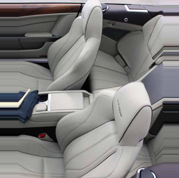 Light grey leather car interior featuring two front bucket seats and wood grain trim on the door panel.