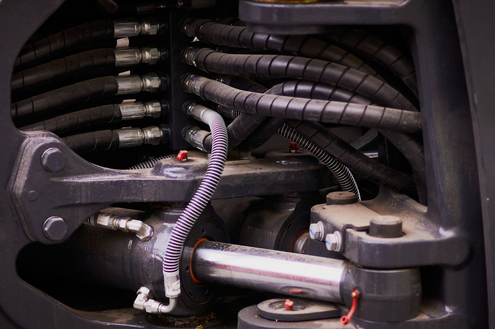 Close-up of Hydraulic Lines and Cylinder on Heavy Machinery — Alloway Hydraulics in Mount Saint John, QLD
