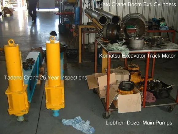 Equipment Repair Shop With Crane Cylinders, Excavator Motor, and Dozer Pumps — Alloway Hydraulics in Mount Saint John, QLD