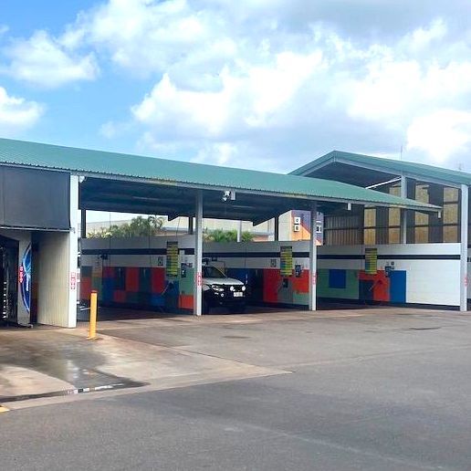 Man Washing a Soapy Black Car With a Cloth, Self Car Wash in Darwin, NT
