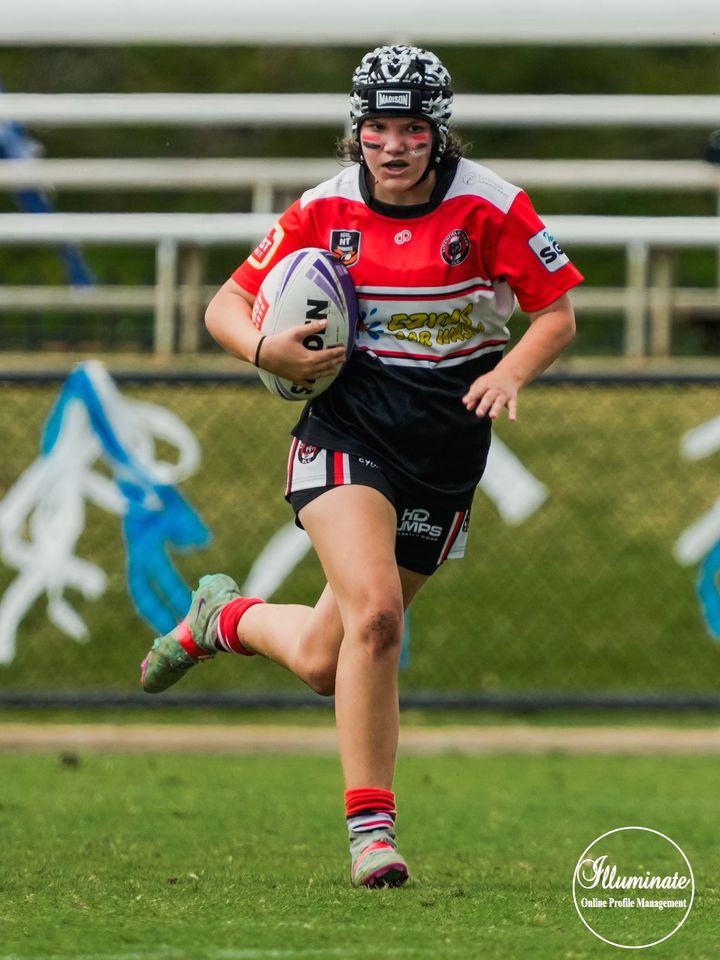 Girl Playing Rugby - Car Wash in Darwin, NT