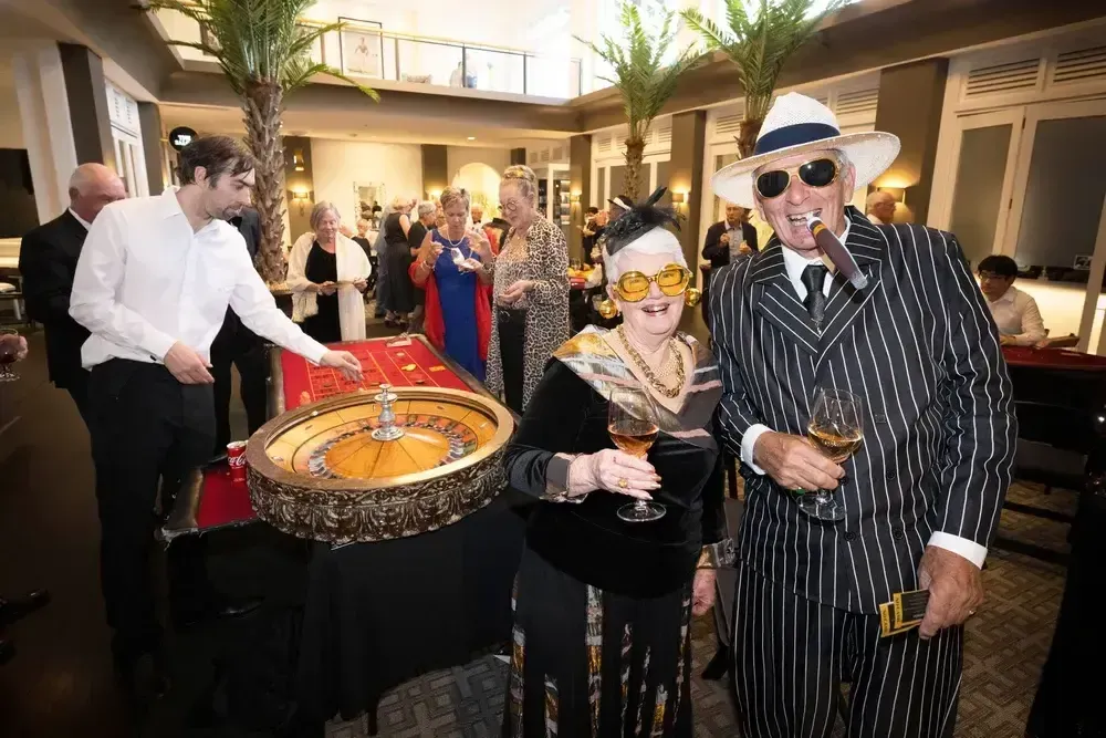 Residents enjoying casino night