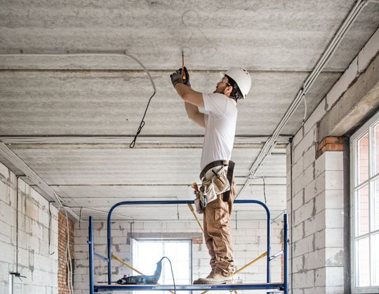 Electrician Installer With A Tool In His Hands — Elma, WA — Schumacher Electric, Inc.