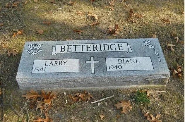 Gravestone with the name BETTERIDGE, memorializing Larry (1944–) and Diane (1940–), on grass.