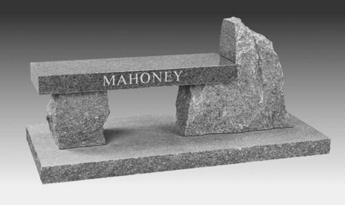 Gray stone bench memorial engraved “MAHONEY” on a rectangular base