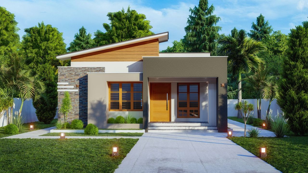Modern bungalow with a gray and wooden exterior, lush green lawn, and a paved driveway.