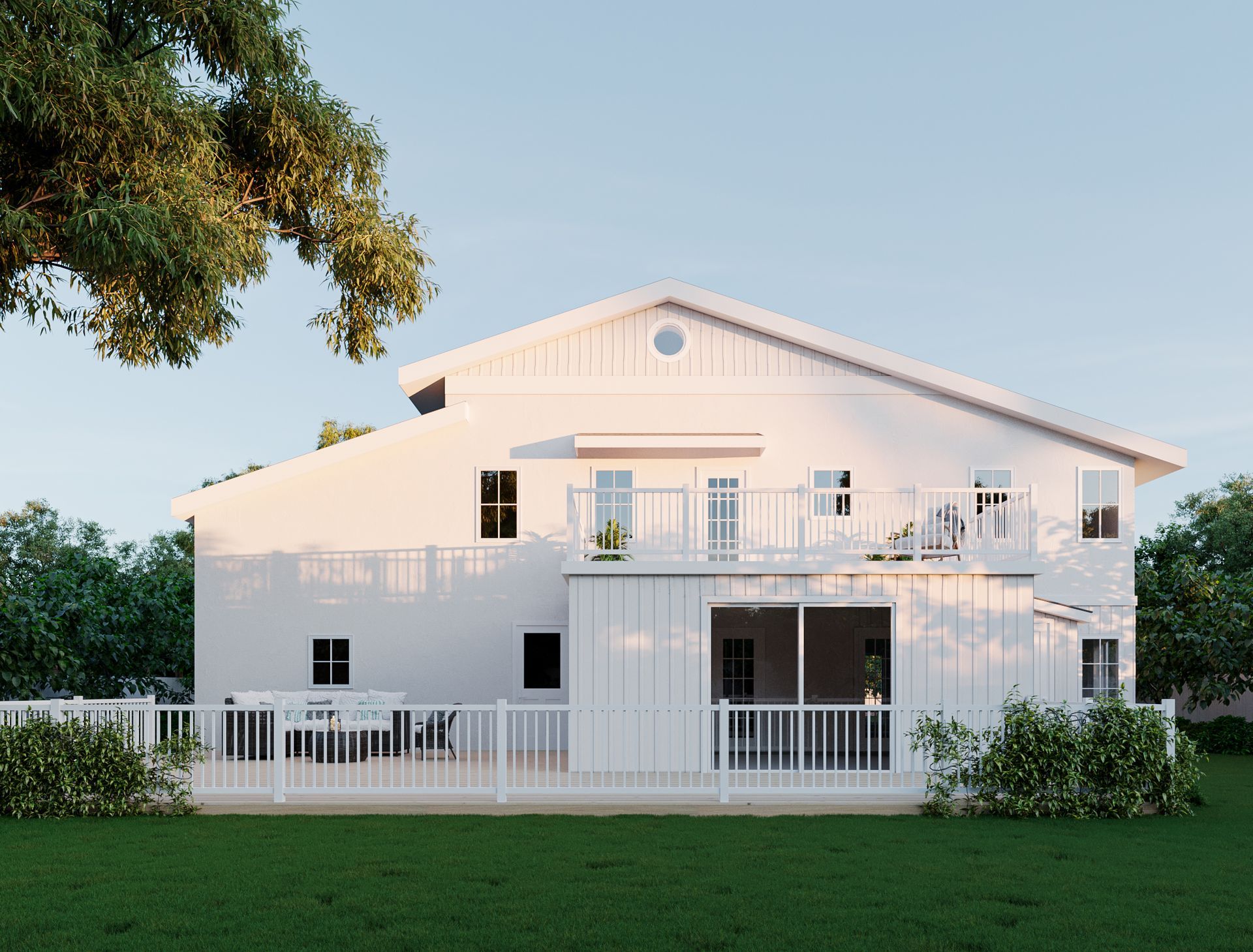 White two-story house with deck and porch, surrounded by trees and greenery.