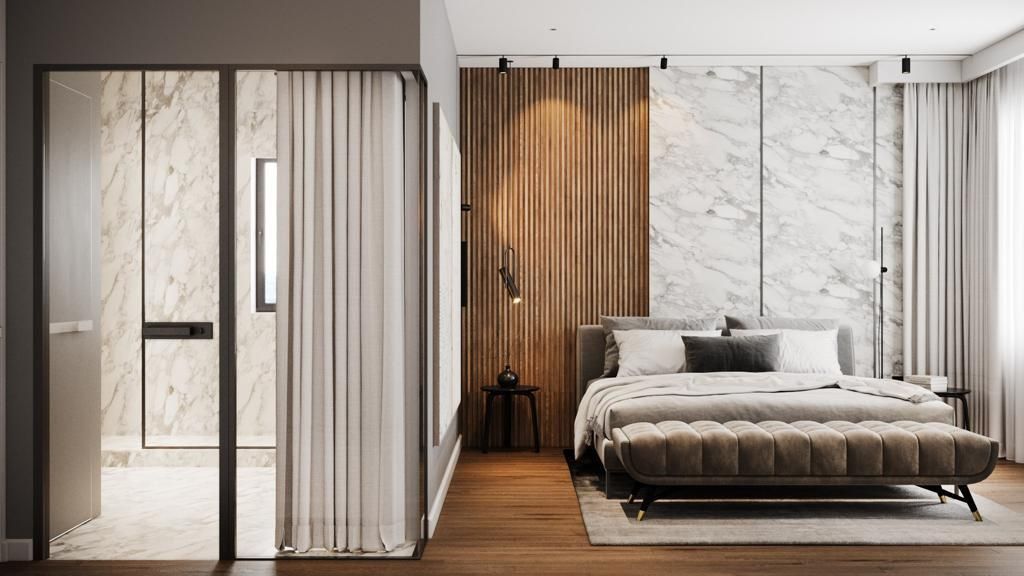 Bedroom with marble accent wall, wooden paneling, and a bed with neutral bedding; a shower is visible.