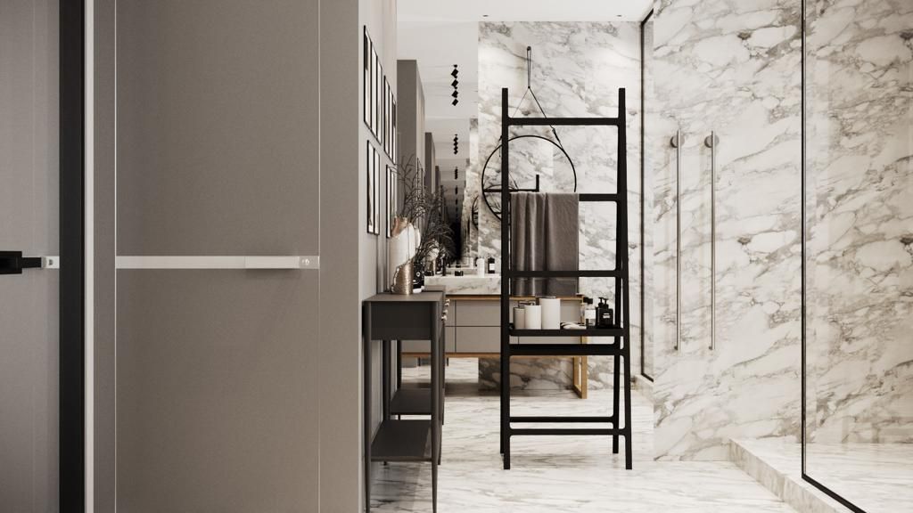 Modern bathroom with marble walls and a black ladder for towels.