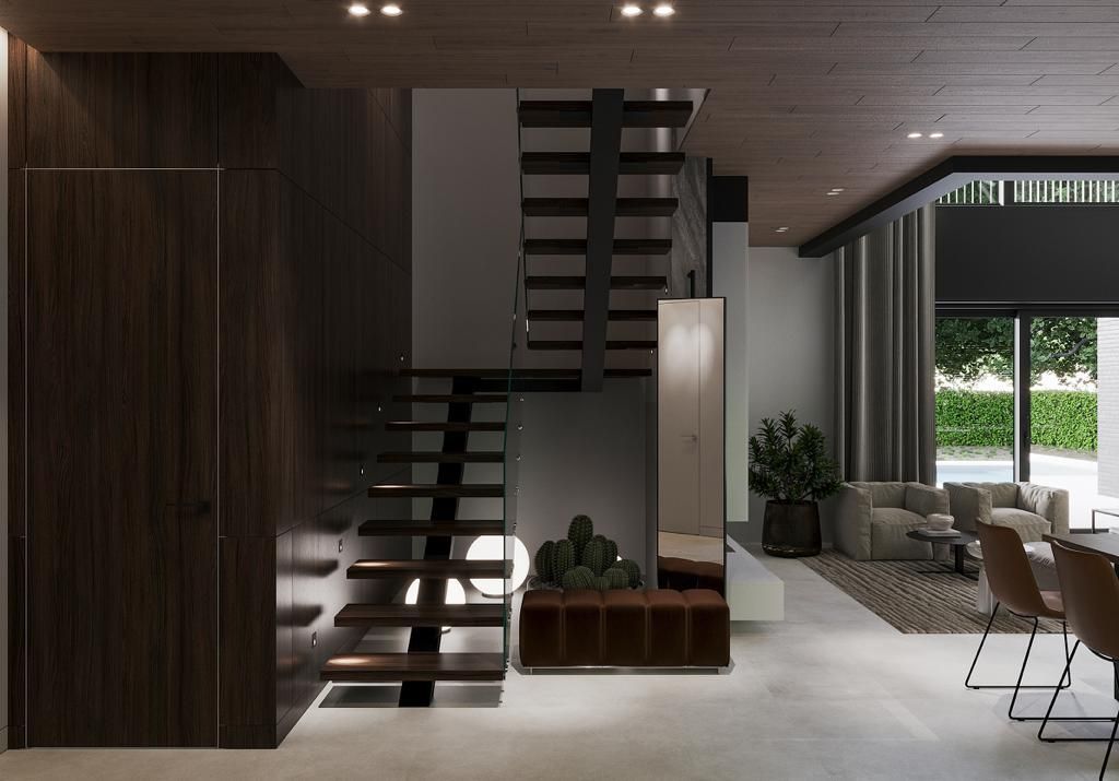 Modern interior with dark wood stairs, cabinets, and a neutral-toned living space.
