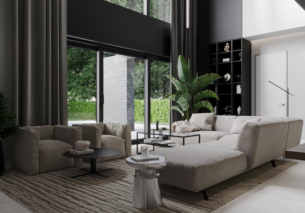 Modern living room with neutral-toned furniture, black accents, and large windows overlooking greenery.